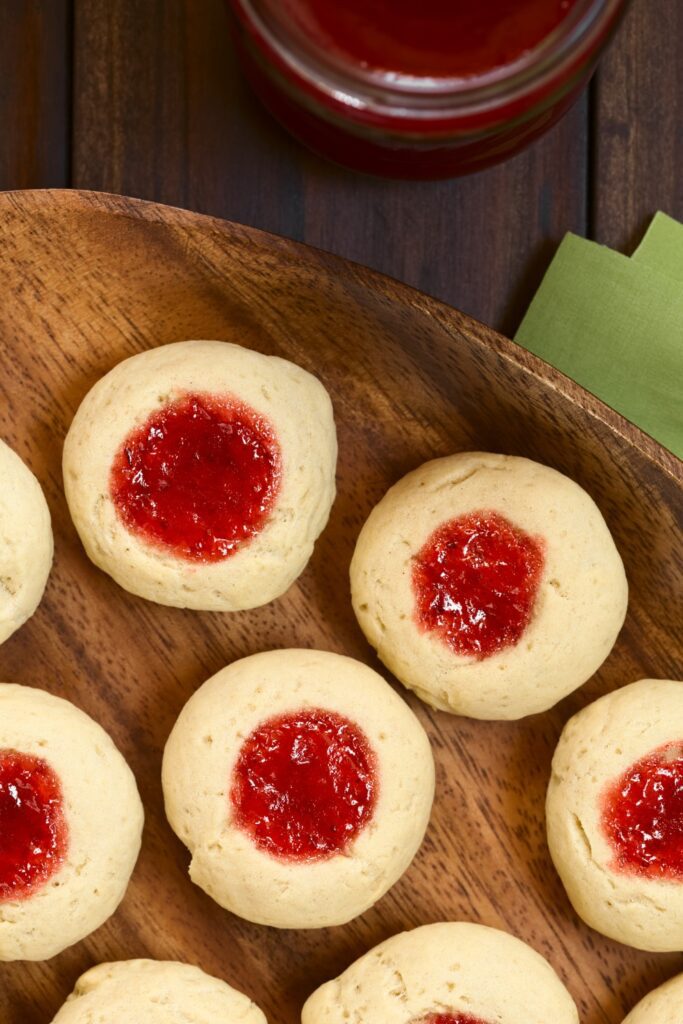 Giada Cherry Almond Thumbprint Cookies with red cherry filling.