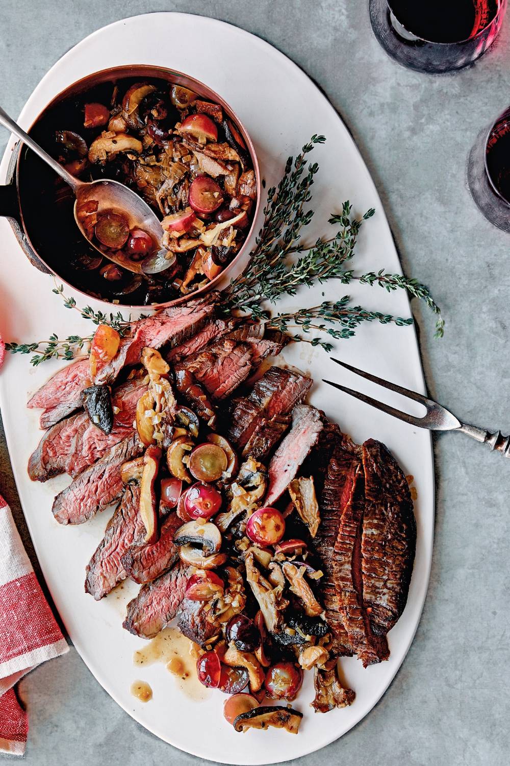 Giada Flank Steak With Roasted Grapes and Mushrooms